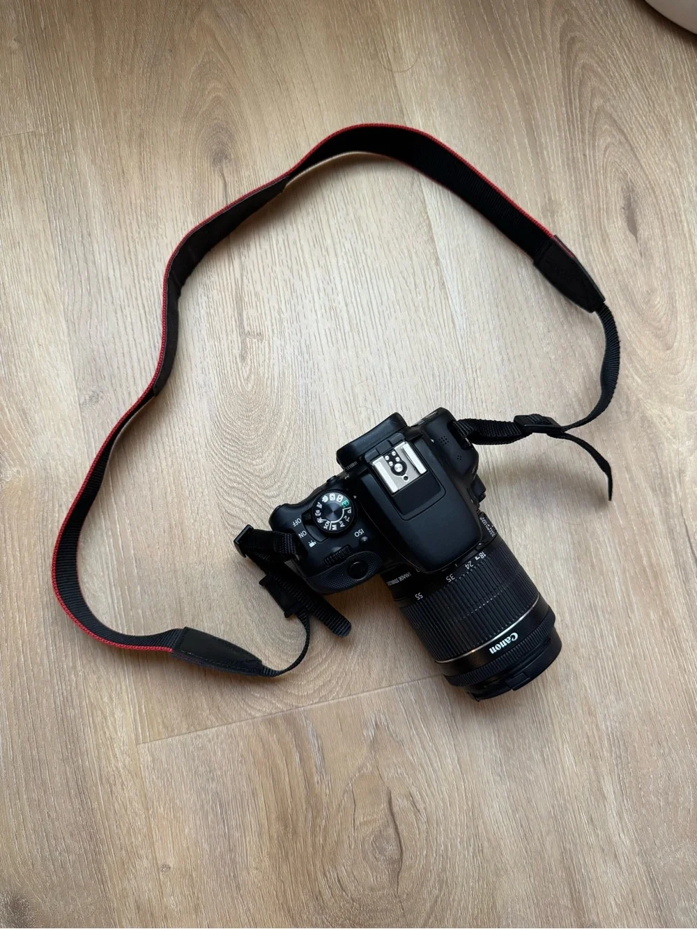 Canon DSLR Camera in Black with Black Zoom Lens